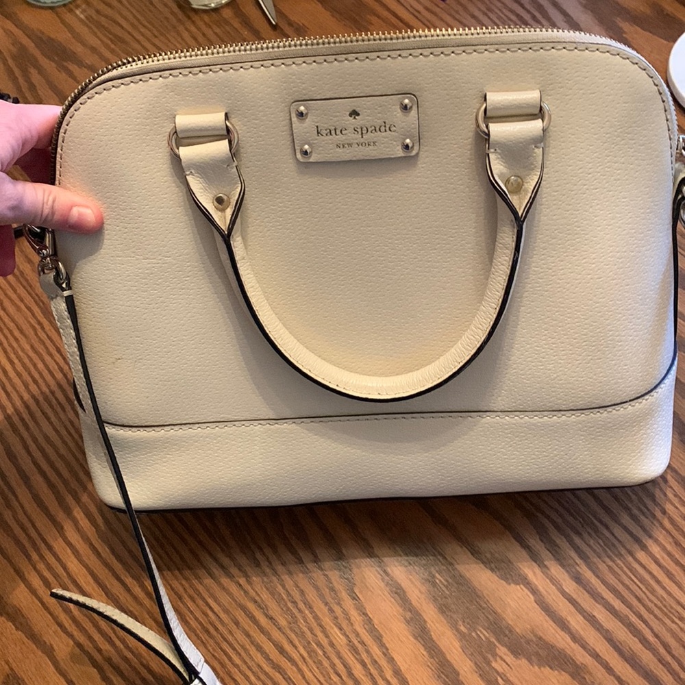 Cream colored Kate spade hand bag